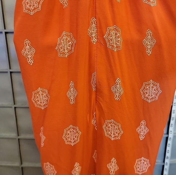 Loft medium orange top. Zipper back with shoulder straps with little pom poms. - Picture 12 of 15